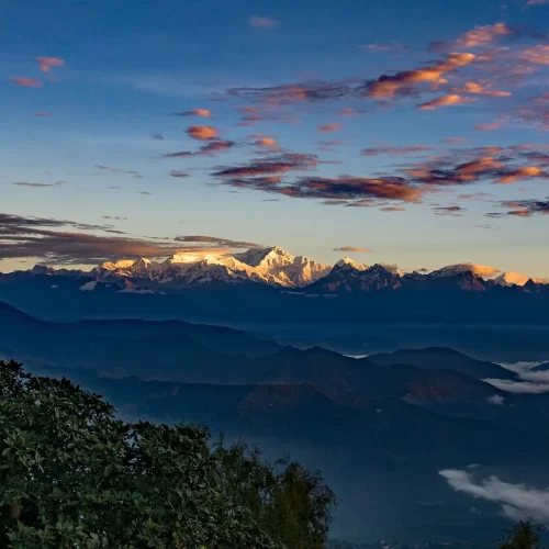 Majestic and breathtaking, Kanchenjunga stands tall, captivating the horizon as seen from enchanting Darjeeling.