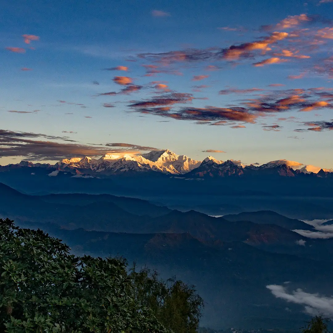 Majestic and breathtaking, Kanchenjunga stands tall, captivating the horizon as seen from enchanting Darjeeling.